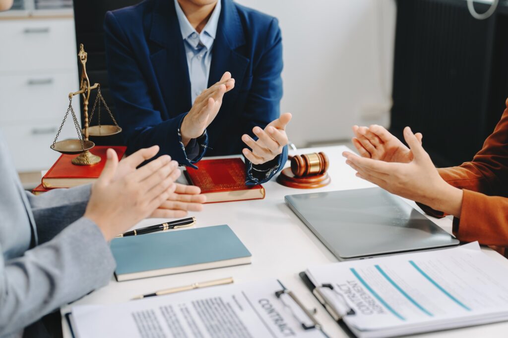 two lawyers are discussing about contract paper l 2024 03 14 08 54 19 utc
