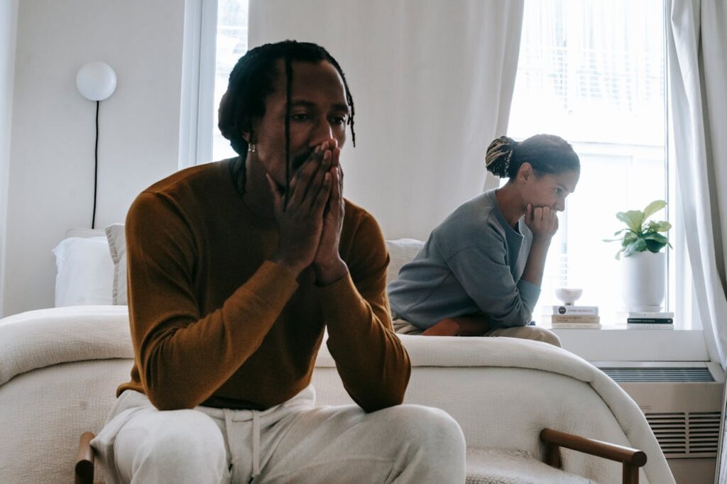 Couple in emotional distress during a conversation about divorce or custody issues, reflecting the complexities of family law.